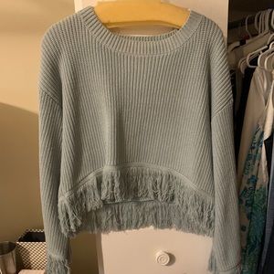 Cropped sweater with fringe